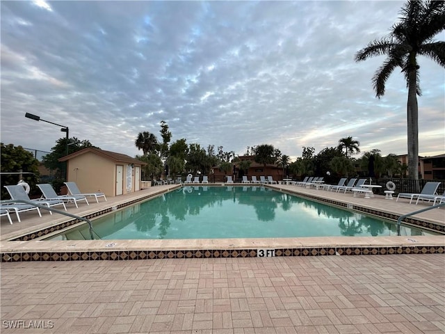 view of swimming pool featuring a patio