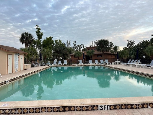 view of swimming pool featuring a patio area