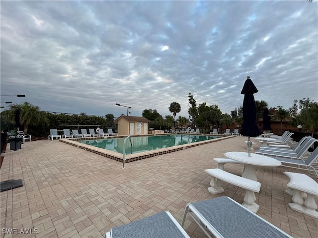 view of pool featuring a patio area