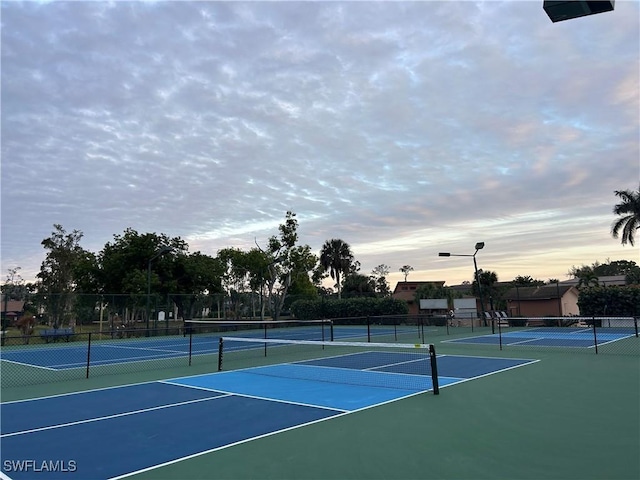 view of tennis court with basketball court