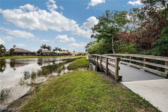 13617 Heritage Preserve Dr, Fort Myers, FL 33905 - dock with a water view, a lawn, and a residential view