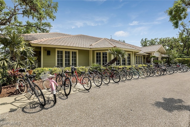 13617 Heritage Preserve Dr, Fort Myers, FL 33905 - rear view of property with a tiled roof