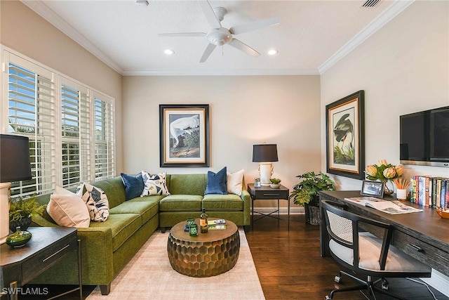 living room featuring hardwood / wood-style flooring, ceiling fan, and ornamental molding