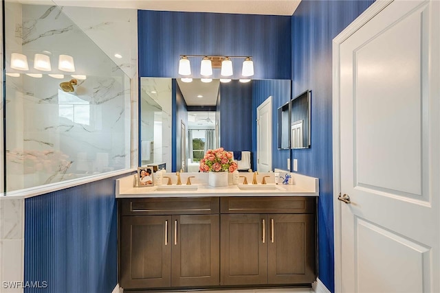 bathroom featuring vanity and tiled shower