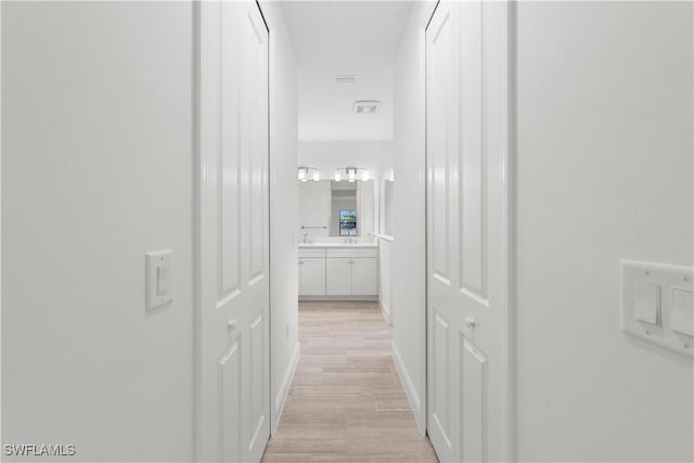 13617 Heritage Preserve Dr, Fort Myers, FL 33905 - hall with light wood-style flooring and baseboards