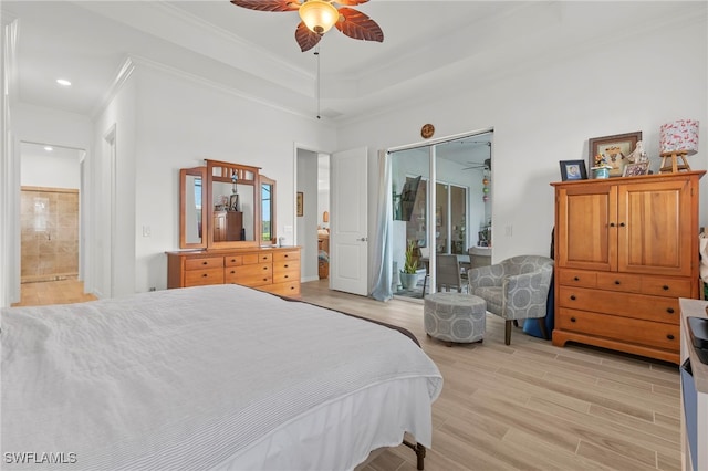 bedroom with access to exterior, light wood-type flooring, ensuite bath, ceiling fan, and crown molding