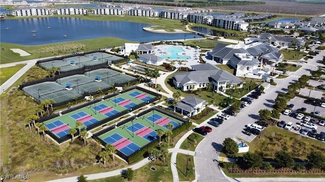 birds eye view of property featuring a water view