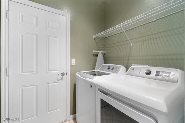 laundry area featuring washer and clothes dryer