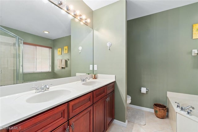 bathroom featuring tile patterned floors, vanity, an enclosed shower, and toilet