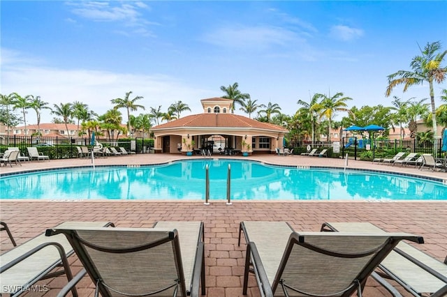 view of swimming pool featuring a patio