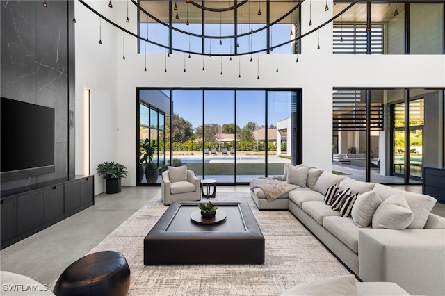 living room with concrete flooring