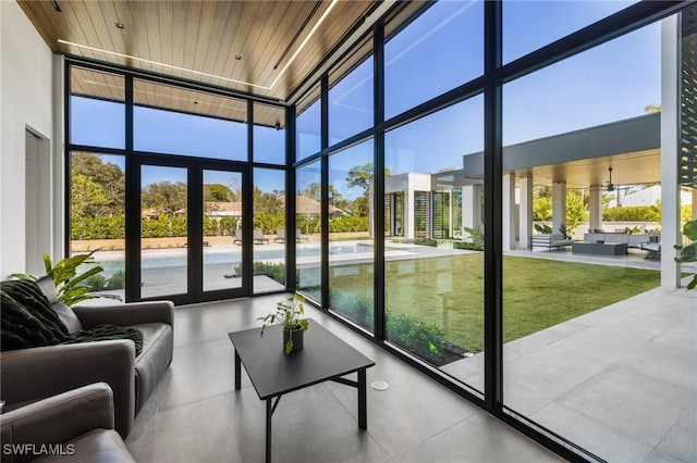 sunroom featuring wood ceiling