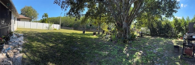 view of yard with fence