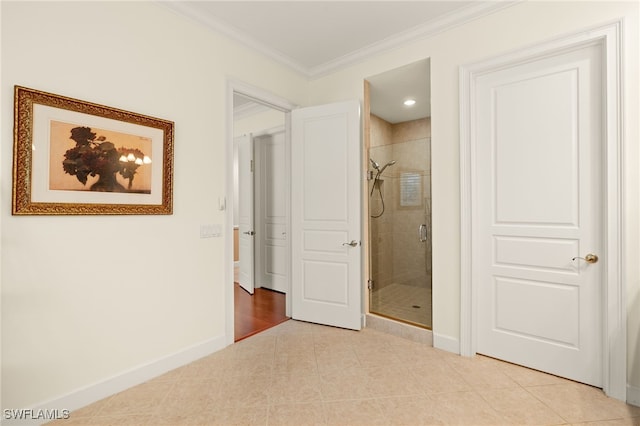 unfurnished bedroom with ornamental molding and light tile patterned floors