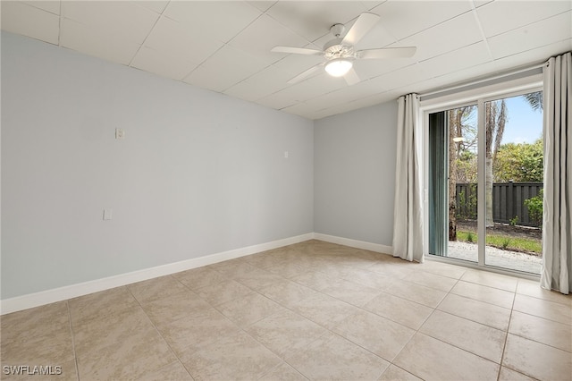 unfurnished room with light tile patterned floors and ceiling fan