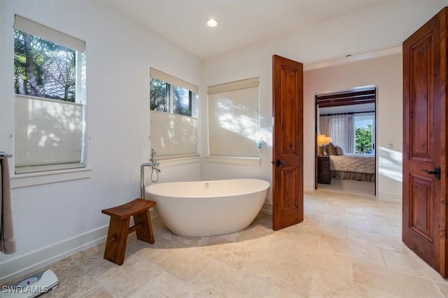 bathroom with a washtub