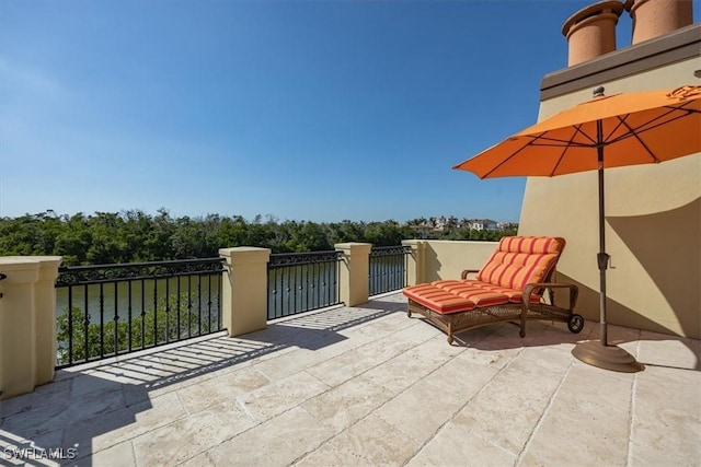 view of patio / terrace featuring a balcony