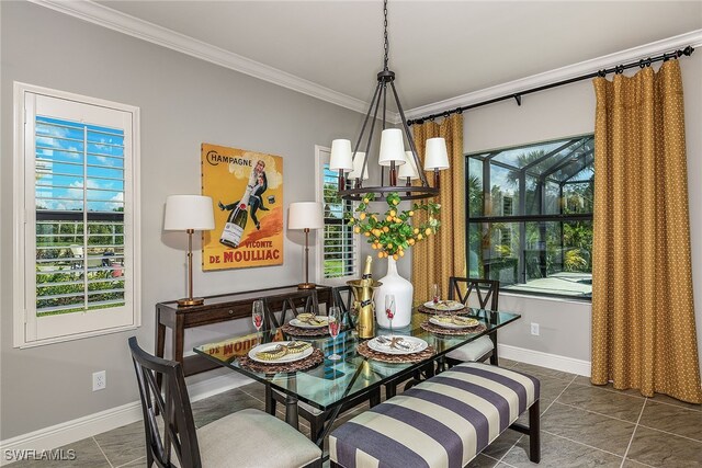 tiled dining area featuring crown molding