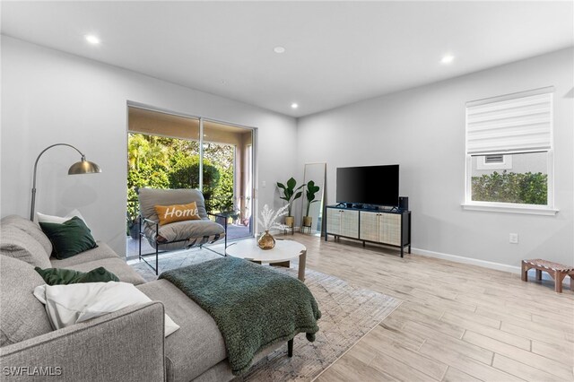 living room featuring light wood-type flooring