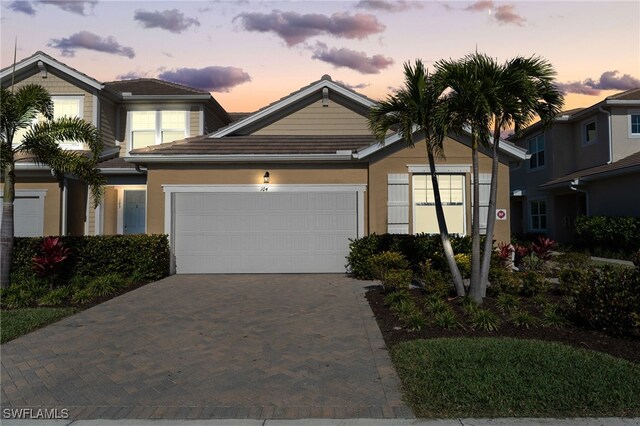 view of front of property featuring a garage