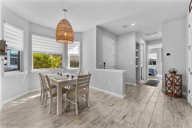 dining space with built in shelves