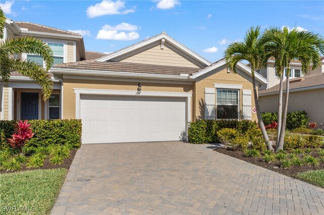 view of front of property with a garage