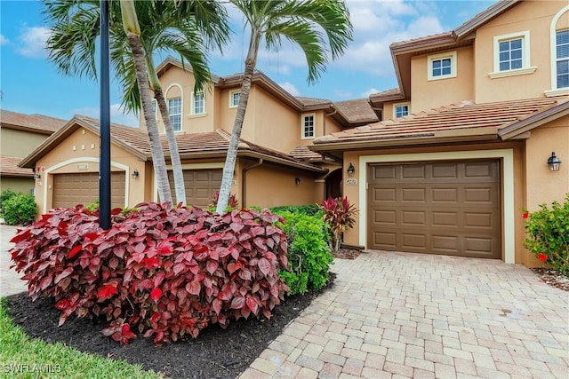 view of front of property with a garage