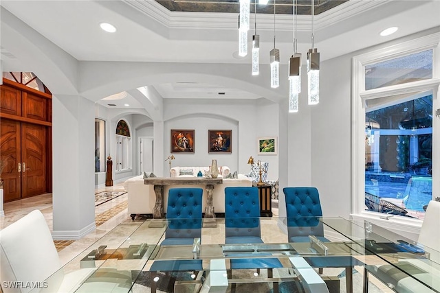 bathroom featuring ornamental molding and a tray ceiling