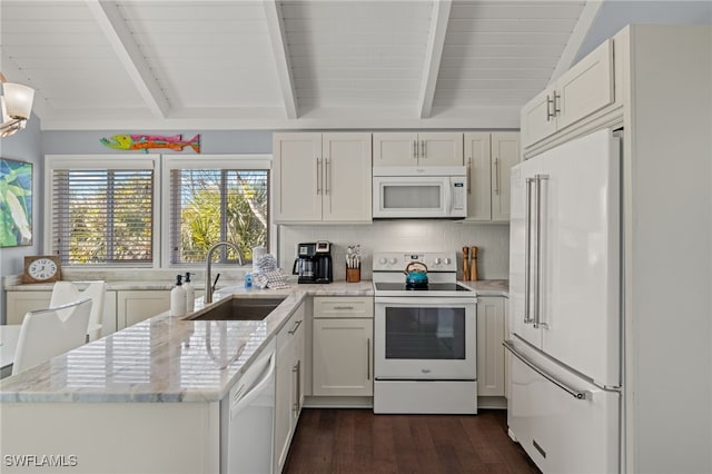 kitchen with white cabinets, white appliances, tasteful backsplash, and sink