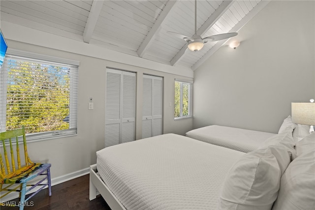 bedroom featuring vaulted ceiling with beams, ceiling fan, wooden ceiling, and dark wood-type flooring