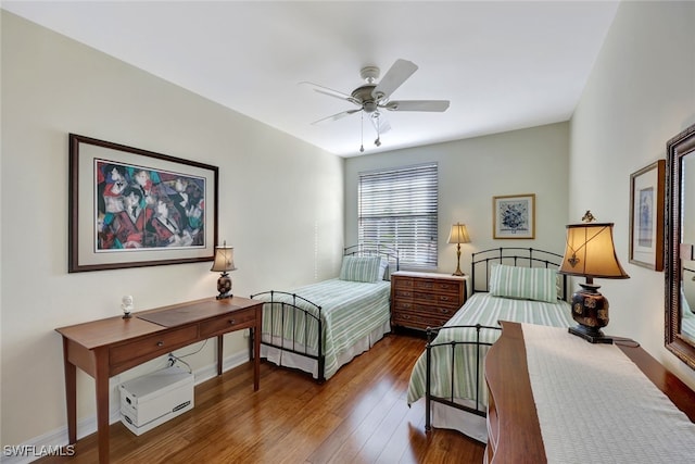 bedroom featuring ceiling fan and hardwood / wood-style floors