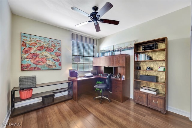 office space featuring ceiling fan and wood-type flooring