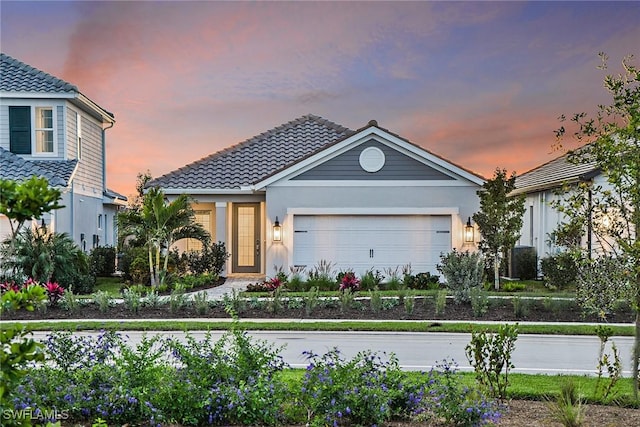 view of front of house with a garage