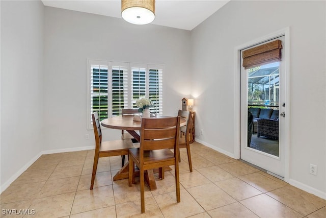 dining space with light tile patterned floors