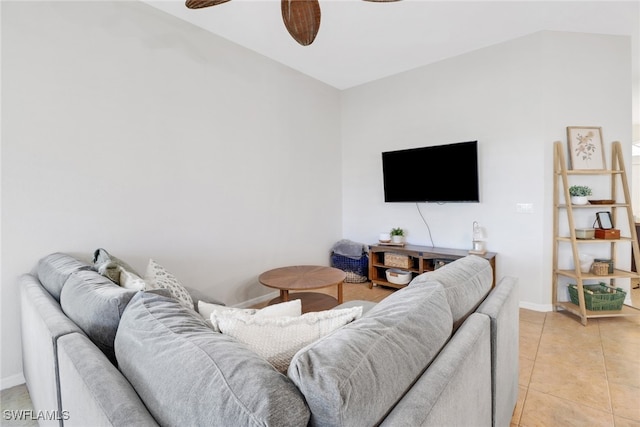 living room with light tile patterned floors and lofted ceiling