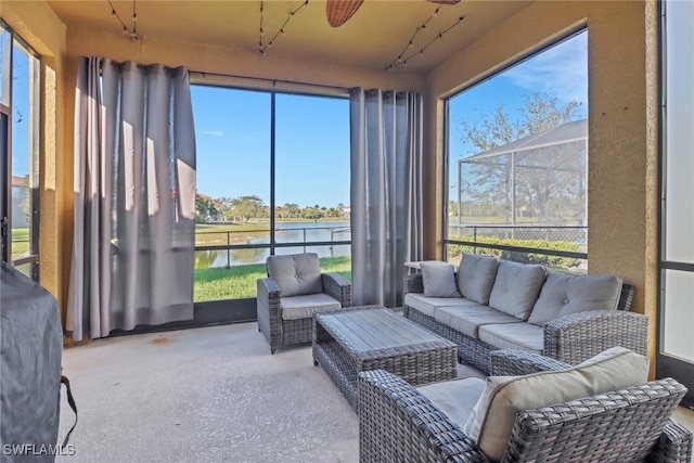 sunroom with a water view