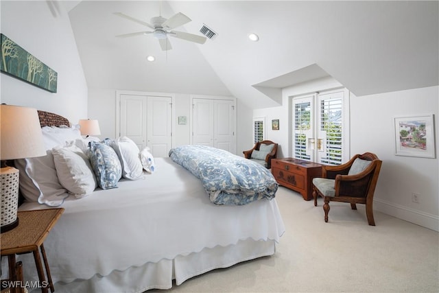 bedroom with multiple closets, recessed lighting, a ceiling fan, light carpet, and vaulted ceiling