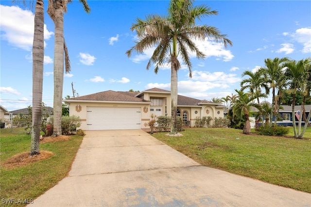 view of front facade featuring a garage and a front yard