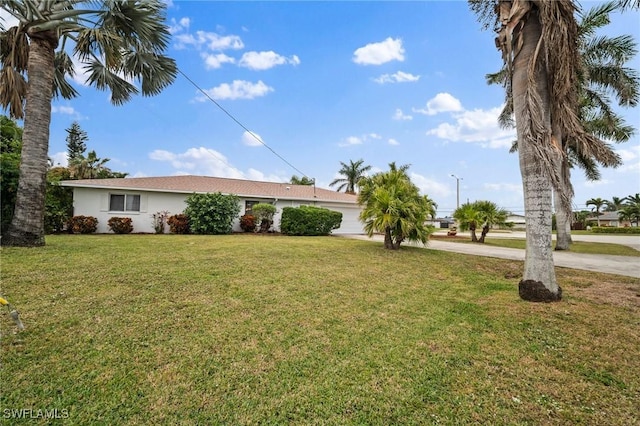 view of front of home with a front lawn