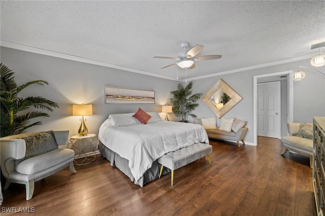 bedroom featuring ceiling fan, dark hardwood / wood-style floors, and ornamental molding