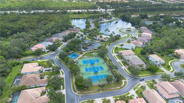 drone / aerial view with a water view