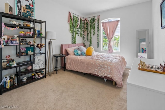 bedroom featuring carpet flooring