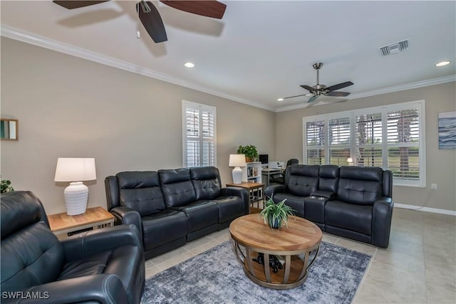 living room featuring light tile patterned flooring, crown molding, and plenty of natural light