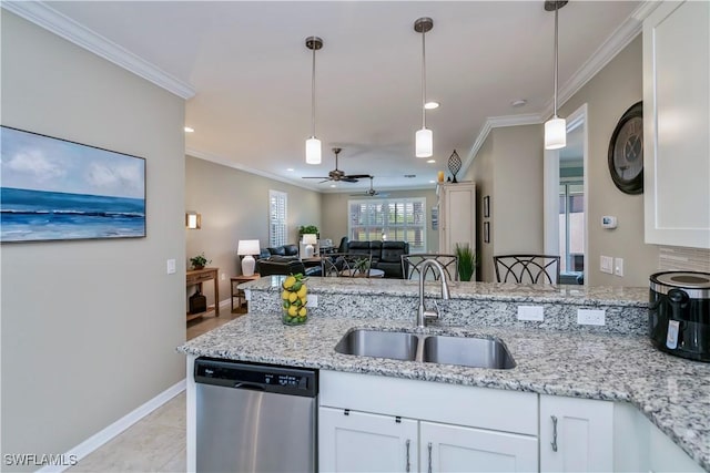 kitchen featuring ceiling fan, white cabinetry, stainless steel dishwasher, and sink