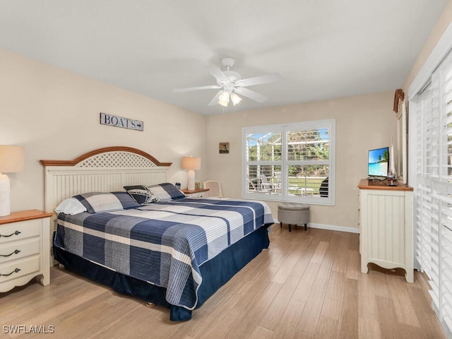 bedroom featuring ceiling fan and light hardwood / wood-style flooring