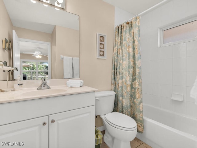 full bathroom featuring shower / tub combo, tile patterned floors, vanity, ceiling fan, and toilet