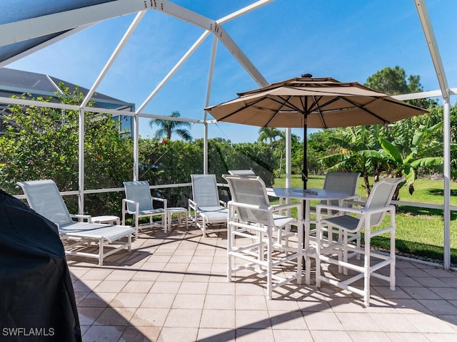 view of patio / terrace with glass enclosure