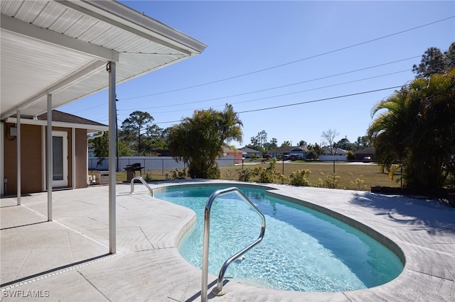 view of pool with a patio area