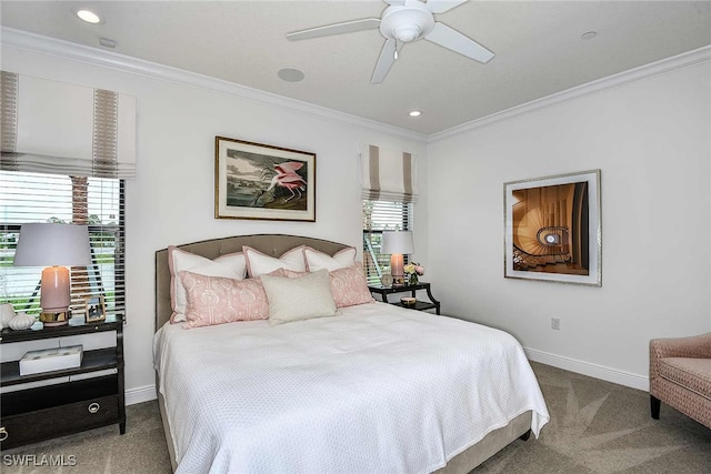 carpeted bedroom featuring ceiling fan and crown molding