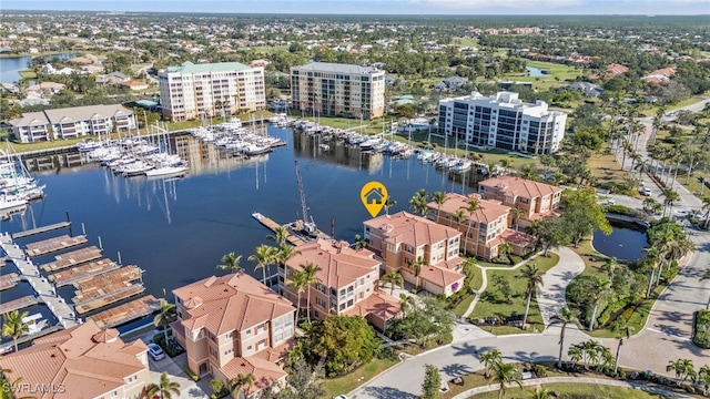 birds eye view of property featuring a water view